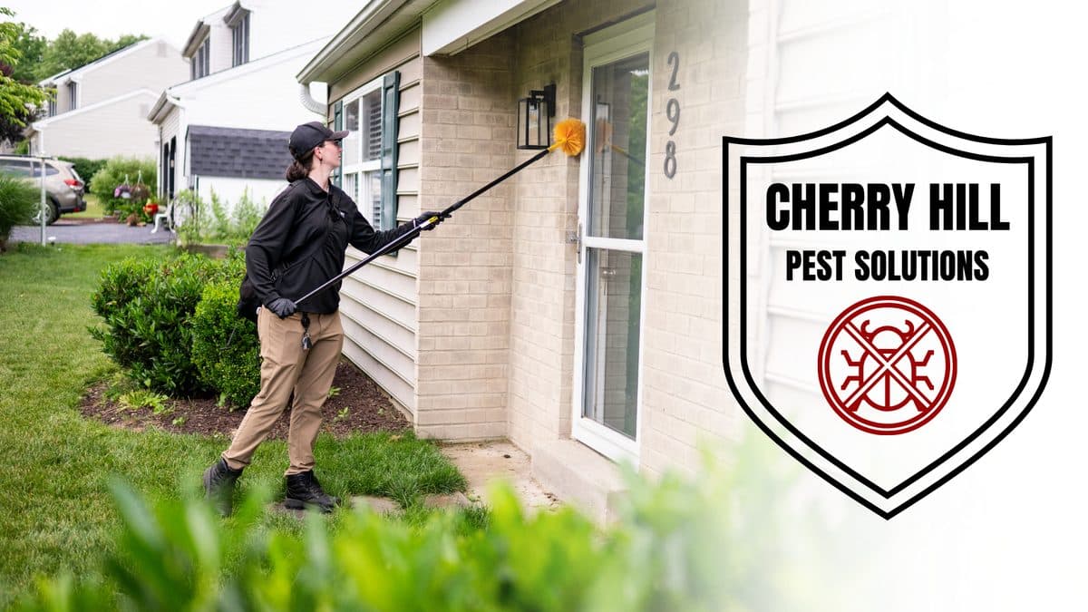 Cherry Hill Pest Solutions technician treating a home